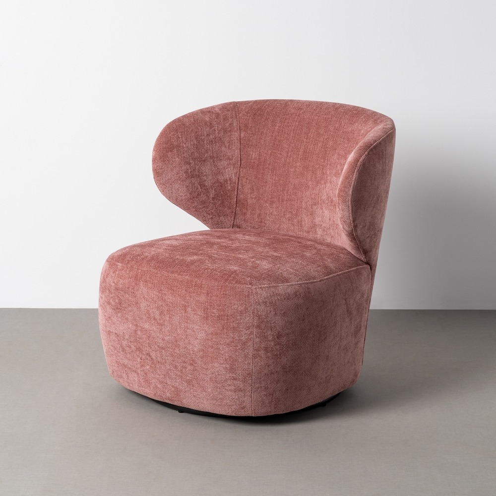 Sillón giratorio rosa tejido y madera